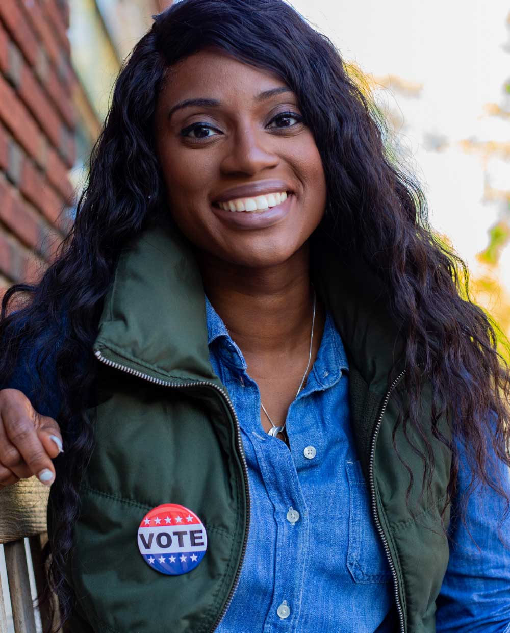 A smiling woman voter