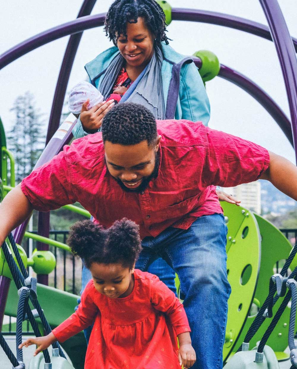 A family having fun at the playground