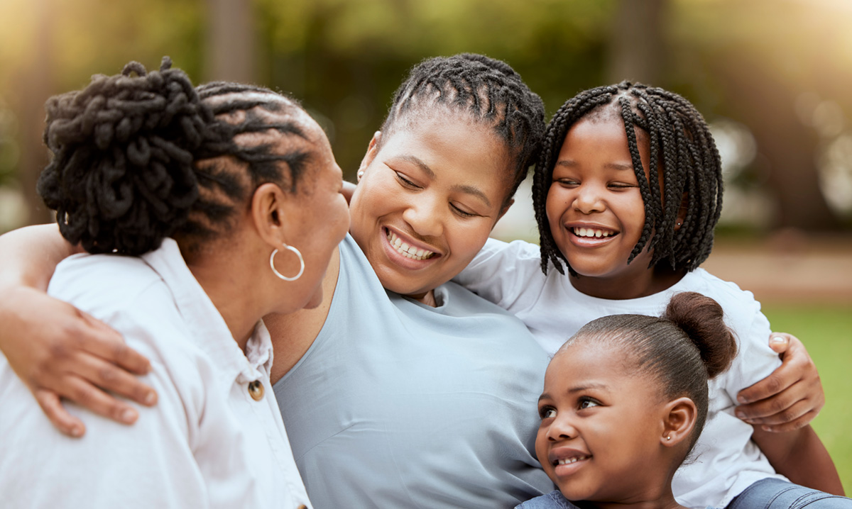 Smiling black family at the park